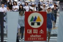 A sign of shelter is seen at an entrance of a subway station in Seoul, South Korea, August 11, 2017. PHOTO BY REUTERS/Kim Hong-Ji