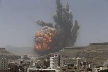 Smoke rises during an air strike on an army weapons depot on a mountain overlooking Yemen's capital Sanaa, April 20, 2015. PHOTO BY REUTERS/Khaled Abdullah