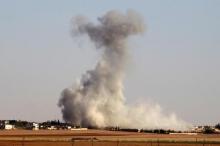Smoke rises from airstrikes on Guzhe village, northern Aleppo countryside, Syria, October 17, 2016. PHOTO BY REUTERS/Khalil Ashawi