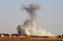Smoke rises from airstrikes on Guzhe village, northern Aleppo countryside, Syria October 17, 2016. PHOTO BY REUTERS/Khalil Ashawi