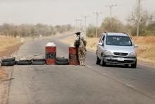 A soldier checks a vehicle at a military check point in Dapchi, Yobe state, Nigeria, February 27, 2018. PHOTO BY REUTERS/Afolabi Sotunde