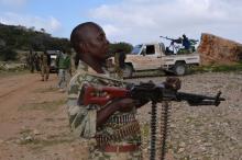 A soldier from Somalia's Puntland keeps guard on high grounds at the Galgala hills, during preparations for an offense against al Shabaab militants. PHOTO BY REUTERS/Abdiqani Hassan