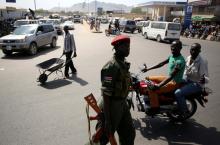 A Sudan People's Liberation Army (SPLA) soldier walks along a street in Juba, South Sudan, December 21, 2013. PHOTO BY REUTERS/Goran Tomasevic