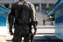 A North Korean soldier patrols at the truce village of Panmunjom inside the demilitarized zone (DMZ) separating the two Koreas, South Korea, April 18, 2018. PHOTO BY REUTERS/Kim Hong-Ji