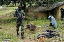 An Ivorian soldier patrols amid houses abandoned during fighting in 2011 in the village of Fete, Ivory Coast, May 21, 2016. PHOTO BY REUTERS/Luc Gnago
