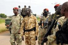 South Sudan National security members stand guard as they protect internally displaced people during a reallocation at the United Nations Mission in South Sudan (UNMISS) compound at the UN House in Jebel, in South Sudan's capital Juba, August 31, 2016. PHOTO BY REUTERS/Jok Solomun