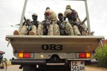 South Sudan National security members ride on their truck as they protect internally displaced people during a reallocation at the United Nations Mission in South Sudan (UNMISS) compound at the UN House in Jebel, in South Sudan's capital Juba, August 31, 2016. PHOTO BY REUTERS/Jok Solomun