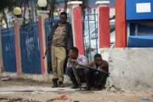Somali government forces hold their positions during gunfire after a suicide bomb attack outside Nasahablood hotel in Somalia's capital Mogadishu, June 25, 2016. PHOTO BY REUTERS/Feisal Omar