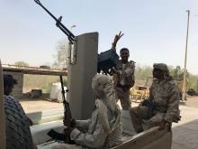 UAE-backed Yemeni soldiers ride on the back of a military patrol vehicle in the Red Sea port city of al-Mokha, Yemen, March 5, 2018. PHOTO BY REUTERS/Aziz El Yaakoubi