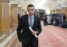 Romania's Prime Minister Sorin Grindeanu leaves a meeting of the Social Democrat Party (PSD) at the parliament in Bucharest, Romania, February 6, 2017. PHOTO BY REUTERS/Inquam Photos