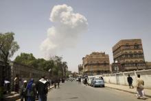 Smoke rises during an air strike on an army weapons depot on a mountain overlooking Yemen's capital Sanaa, April 20, 2015. PHOTO BY REUTERS/Mohamed al-Sayaghi