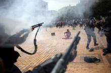 A student is seen during clashes with South African police at Johannesburg's University of the Witwatersrand, South Africa, October 4, 2016. PHOTO BY REUTERS/Siphiwe Sibeko