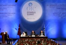 Secretary General of the Organization of Islamic Cooperation (OIC) Iyad bin Amin Madani, Foreign Ministers Sameh Shoukry of Egypt (2nd R) and Mevlut Cavusoglu of Turkey (R) are seen during the opening session of the OIC Istanbul Summit in Istanbul, Turkey, April 14, 2016. PHOTO BY REUTERS/Sebnem Coskun