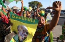 Supporters of Tanzania Presidential candidate of the ruling Chama Cha Mapinduzi (CCM) John Pombe Magufuli celebrate after he was declared the winner of the presidential election, in Dar es Salaam, October 29, 2015. PHOTO BY REUTERS/Emmanuel Herman