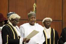 National Assembly Clerk Salisu Maikasuwa (L) swears in Rt. Hon Yakubu Dogara as the new Speaker of the House Of Representatives in Abuja, Nigeria, June 9, 2015. PHOTO BY REUTERS/Afolabi Sotunde