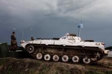 United Nations peacekeepers guard a United Nations base in Malarial, July 23, 2014. PHOTO BY REUTERS/Andreea Campeanu