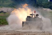 A Japan Ground Self Defense Force's Type 90 tank fires during their joint exercise, named Northern Viper 17, with U.S. Marine Corps at Hokudaien exercise area in Eniwa, on the northern island of Hokkaido, Japan, August 16, 2017. PHOTO BY REUTERS/Toru Hanai