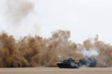 M60A3 tanks fire smoke bombs during Han Kuang military drill simulating the China's People's Liberation Army (PLA) invading the island, at Ching Chuan Kang Air Base, in Taichung, Taiwan, June 7, 2018. PHOTO BY REUTERS/Tyrone Siu