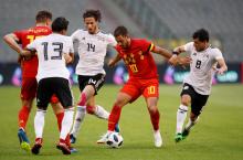 Belgium's Eden Hazard in action with Egypt's Tarek Hamed and Ramadan Sobhi. PHOTO BY REUTERS/Francois Lenoir