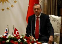 Turkish President Tayyip Erdogan speaks to media after his meeting with Britain's Prime Minister Theresa May at the Presidential Palace in Ankara, Turkey, January 28, 2017. PHOTO BY REUTERS/Umit Bektas