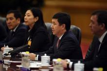 Kyrgyzstan's Prime Minister Temir Sariyev (2nd R) speaks with Chinese Premier Li Keqiang (not seen) during a meeting in the Great Hall of the People in Beijing, December 16, 2015. PHOTO BY REUTERS/Greg Baker