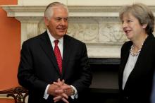 Britain's Prime Minister Theresa May greets U.S. Secretary of State Rex Tillerson at 10 Downing street in London, Britain, September 14, 2017. PHOTO BY REUTERS/U.S. Embassy London Official Photographer