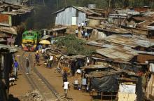 A train passes through the Kibera slum of Kenya's capital Nairobi, February 26, 2015. PHOTO BY REUTERS/Darrin Zammit Lupi