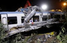 One of the two passenger trains collided in the middle of an olive grove is seen in the southern village of Corato, near Bari, Italy, July 12, 2016. PHOTO BY REUTERS/Alessandro Garofalo