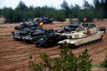 U.S., German, Spanish and Polish troops of the NATO enhanced Forward Presence battle goups with their tanks get ready for the Iron Tomahawk exercise in Adazi, Latvia, October 23, 2018. PHOTO BY REUTERS/Ints Kalnins