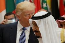 U.S. President Donald Trump and Saudi Arabia's King Salman bin Abdulaziz Al Saud (R) attend the Arab Islamic American Summit in Riyadh, Saudi Arabia, May 21, 2017. PHOTO BY REUTERS/Jonathan Ernst