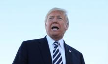 U.S. President Donald Trump speaks with reporters before departure from Elko Regional Airport in Elko, Nevada, U.S., October 20, 2018. PHOTO BY REUTERS/Jonathan Ernst