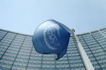 The flag of the International Atomic Energy Agency (IAEA) flies in front of its headquarters in Vienna, Austria, May 28, 2015. PHOTO BY REUTERS/Heinz-Peter Bader