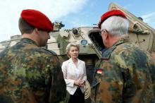 German Defence Minister Ursula von der Leyen speaks with soldiers during her visit of the Bundeswehr ABC defence battalion 750 in Bruchsal, Germany, August 10, 2016. PHOTO BY REUTERS/Ralph Orlowski