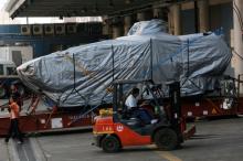 One of nine Terrex armoured vehicles, which belong to Singapore, waits to be loaded onto a truck at a cargo terminal in Hong Kong, China, January 26, 2017. PHOTO BY REUTERS/Bobby Yip