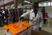 A Zambian voter casts his ballot at a voting station in Lusaka, January 20, 2015. PHOTO BY REUTERS/Rogan Ward