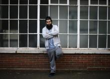 Waseem Iqbal poses for a photograph in Birmingham, central England, November 20, 2014. PHOTO BY REUTERS/Darren Staples