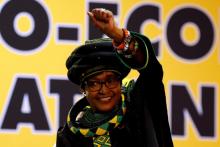 Winnie Madikizela Mandela, ex-wife of former South African president Nelson Mandela, gestures to supporters at the 54th National Conference of the ruling African National Congress (ANC) at the Nasrec Expo Centre in Johannesburg, South Africa, December 16, 2017. PHOTO BY REUTERS/Siphiwe Sibeko