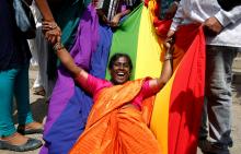 An activist of lesbian, gay, bisexual and transgender (LGBT) community celebrates after the Supreme Court's verdict of decriminalizing gay sex and revocation of the Section 377 law, in Bengaluru, India, September 6, 2018. PHOTO BY REUTERS/Abhishek N. Chinnappa