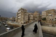 Women walk on a bridge in the old quarter of Yemen's capital Sanaa, April 9, 2016. PHOTO BY REUTERS/Khaled Abdullah
