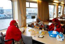 Women from Somalia eat in the common area of floating hotel "Amanpuri", housing migrants whose asylum procedure has been declined in Groningen, Netherlands, February 10, 2017. PHOTO BY REUTERS/Francois Lenoir