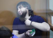 Zaur Dadayev, convicted of involvement in the killing of Russian opposition leader Boris Nemtsov, sits inside the defendants' cage during his sentencing hearing at the Moscow military district court, Russia, July 13, 2017. PHOTO BY REUTERS/Tatyana Makeyeva