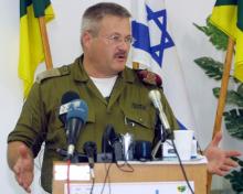 Brigadier-General Yisrael Ziv, commander of Israeli forces in Gaza, speaks at a news conference in Gaza, September 3, 2002. PHOTO BY REUTERS/Tsafrir Abayov